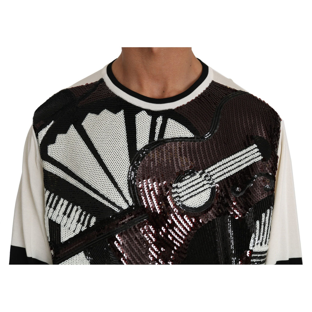 Dolce & Gabbana white jazz sequined guitar pullover sweater with long sleeves and a crew neckline, stylish and eye-catching.