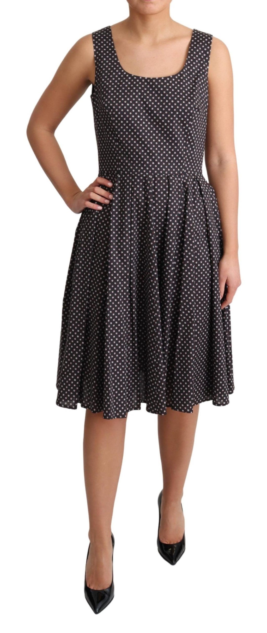 Dolce & Gabbana black floral cotton A-line stretch dress with a fitted waist and elegant design.