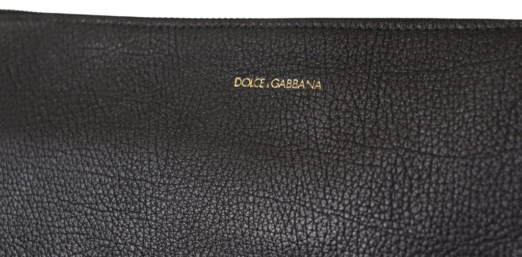 Dolce & Gabbana black exotic leather shoulder sling bag with gold hardware and textured design.