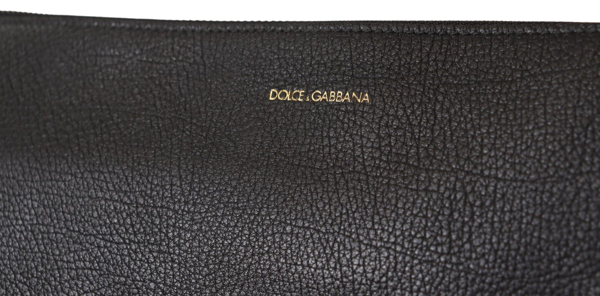 Dolce & Gabbana black exotic leather shoulder sling bag with gold hardware and textured design.