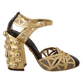 Dolce & Gabbana black leather ankle strap shoes with gold accents and studded details, stylish and elegant footwear.