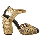 Dolce & Gabbana black leather ankle strap shoes with gold accents and studded details, stylish and elegant footwear.