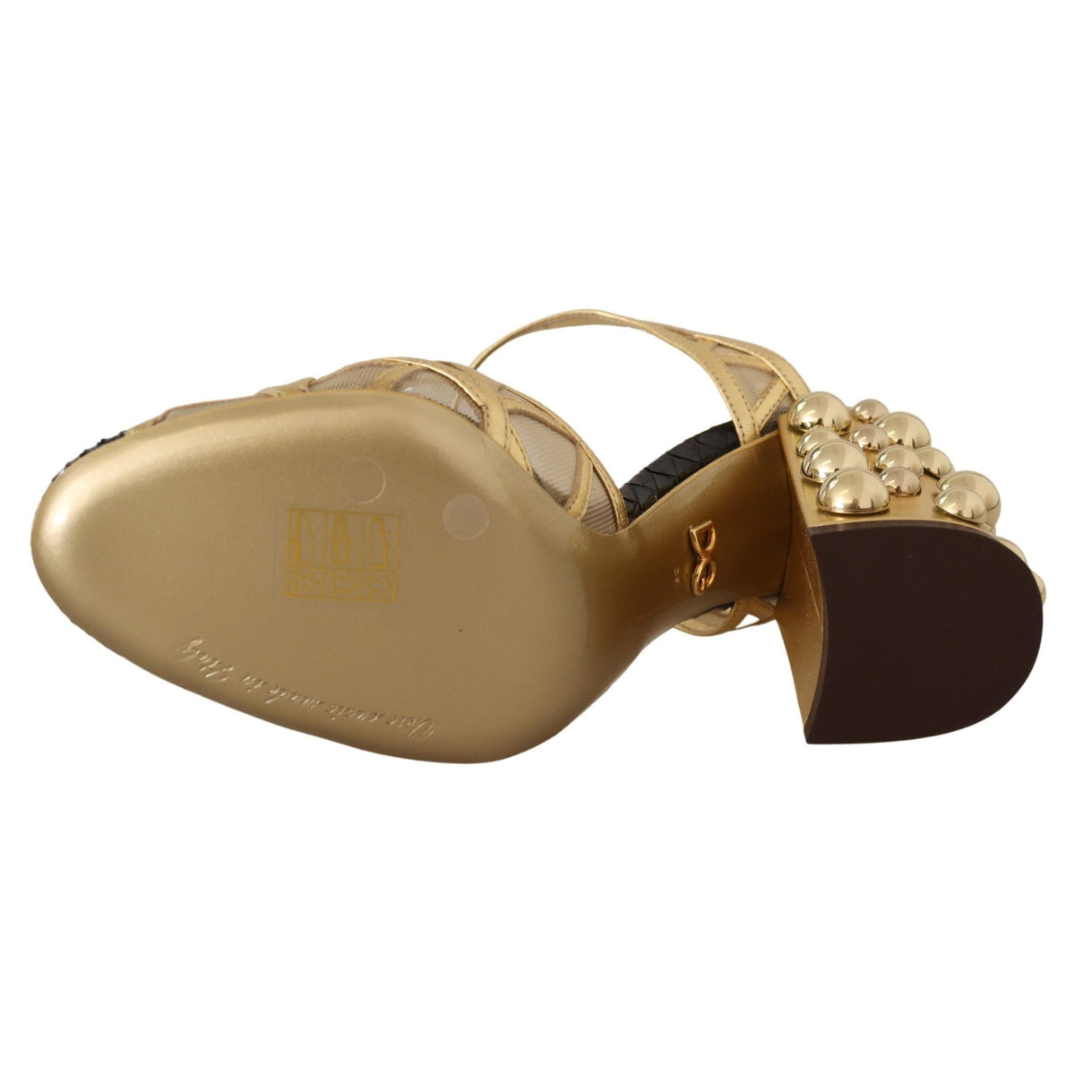 Black leather ankle strap shoes with gold studs by Dolce & Gabbana featuring a sleek design and stylish detailing.
