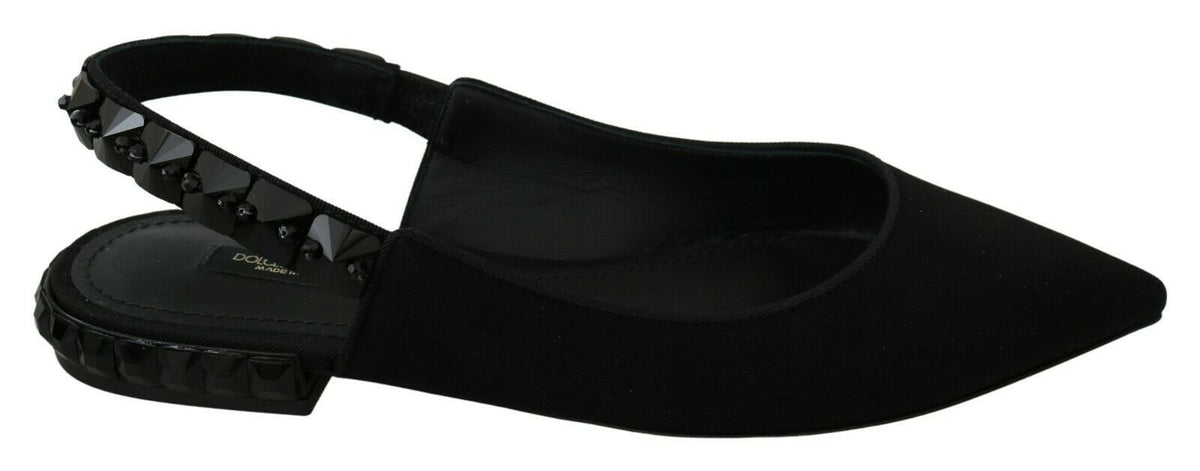 Dolce & Gabbana black slingback flats with charmeuse fabric, featuring a sleek and elegant design for stylish wear.