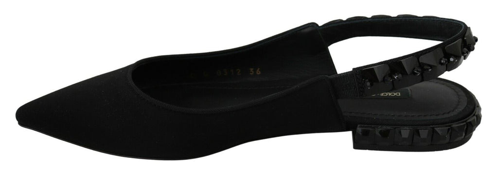 Black Dolce & Gabbana slingback flats with charmeuse fabric, featuring elegant pointed toes and sleek design.