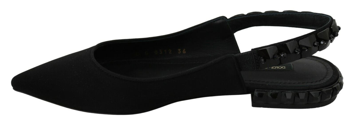 Black Dolce & Gabbana slingback flats with charmeuse fabric, featuring elegant pointed toes and sleek design.