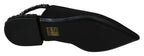 Black Dolce & Gabbana flats slingback shoes with charmeuse fabric and elegant design, perfect for sophisticated style.
