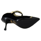 Dolce & Gabbana black velvet Mary Jane pumps with embellished details and a classic strap, stylish and elegant footwear.