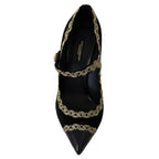 Dolce & Gabbana black velvet Mary Jane pumps with embellished details and chunky heel on elegant shoes display.
