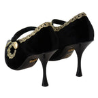 Dolce & Gabbana black velvet embellished Mary Jane pumps with decorative details and a classic slip-on design.