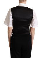Dolce & Gabbana black and gold jacquard silk waistcoat vest with intricate pattern and tailored fit.