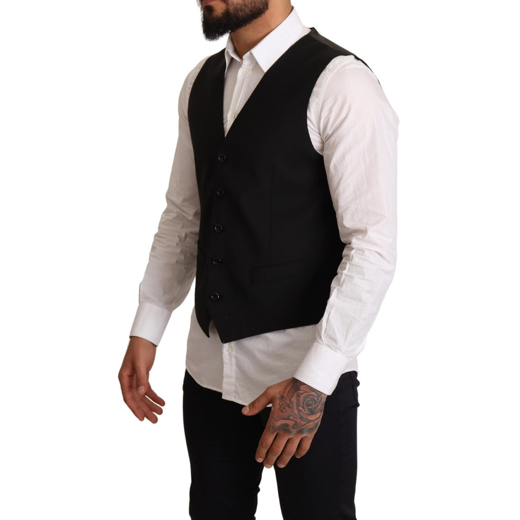 Black Dolce & Gabbana formal dress vest displayed on a mannequin, highlighting tailored fit and sleek design.