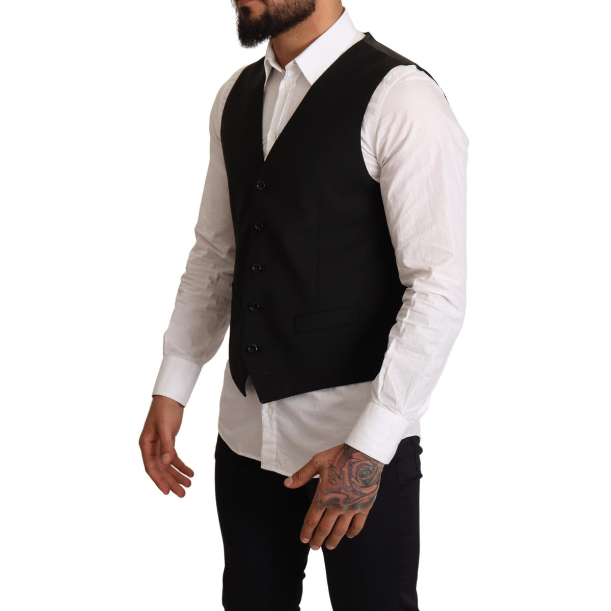 Black Dolce & Gabbana formal dress vest displayed on a mannequin, highlighting tailored fit and sleek design.