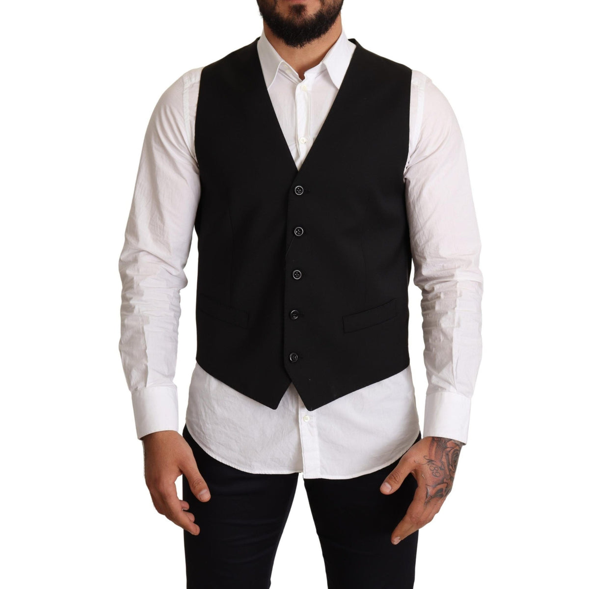 Black formal dress vest by Dolce & Gabbana, tailored fit with sleek fabric and elegant design, displayed on a mannequin.