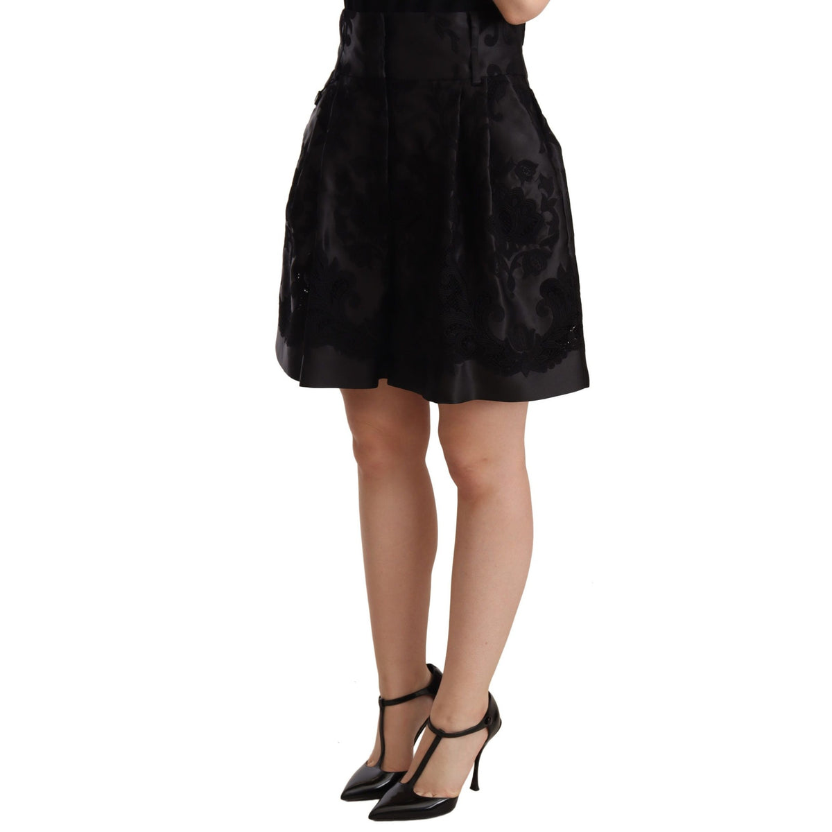 Black floral brocade high waist mini shorts by Dolce & Gabbana with intricate floral patterns and a fitted high-rise design.