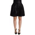 Dolce & Gabbana black floral brocade high-waist mini shorts with intricate floral pattern and tailored fit.