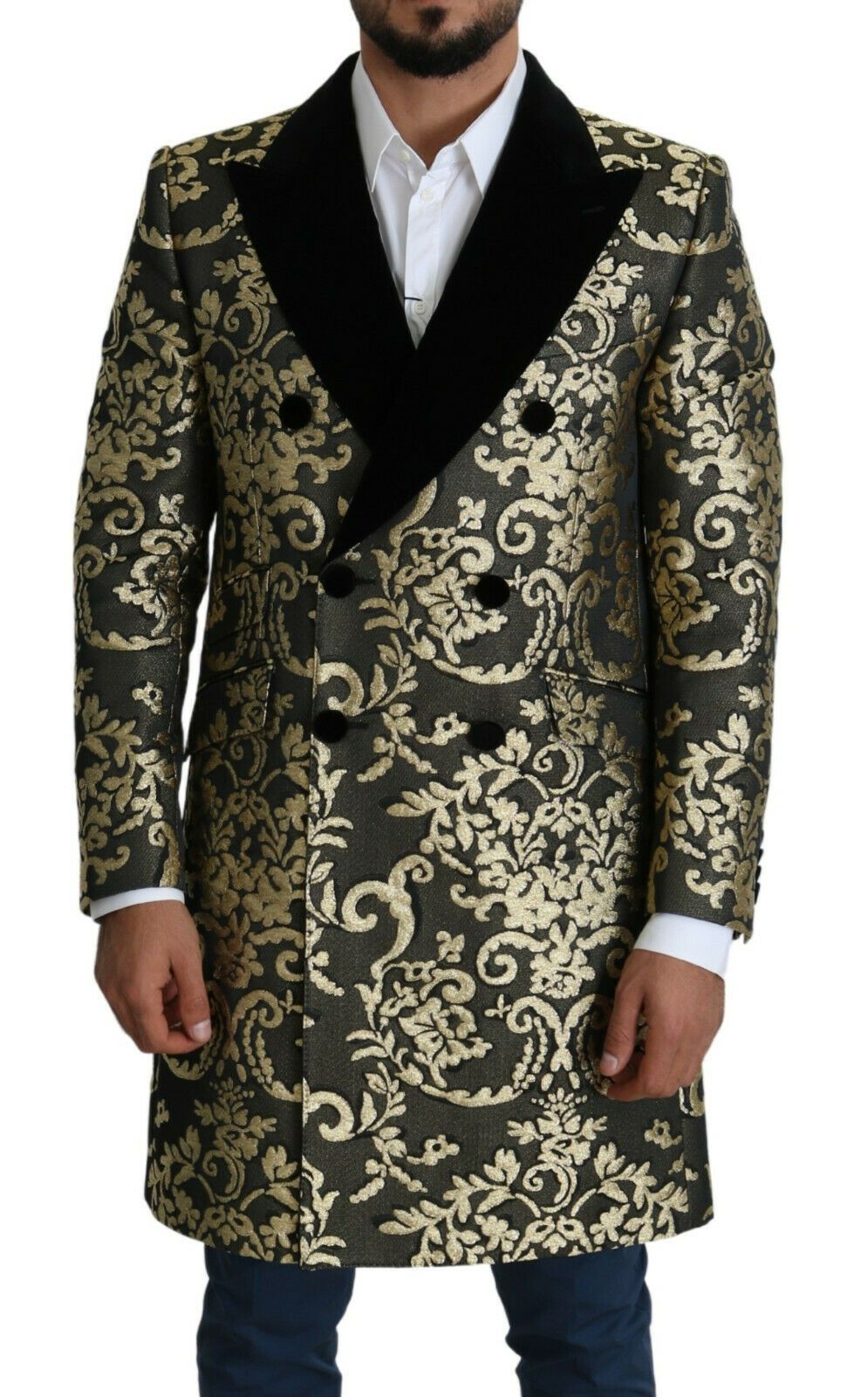 Dolce & Gabbana black gold jacquard long coat with intricate pattern and tailored fit, showcased on a model.