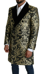 Dolce & Gabbana black and gold jacquard long coat with intricate pattern, Sicilia jacket style, luxurious fashion outerwear.