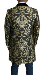 Dolce & Gabbana black and gold jacquard long coat, Sicilia jacket style, with intricate pattern and tailored fit.