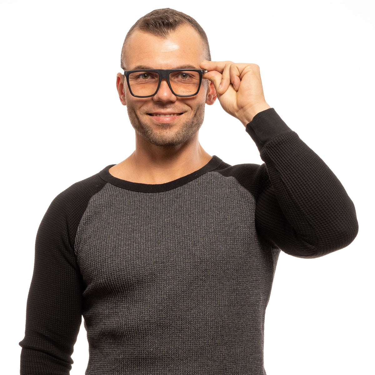 Yohji Yamamoto black plastic eyeglass frames with a sleek, modern design, shown in a close-up image.