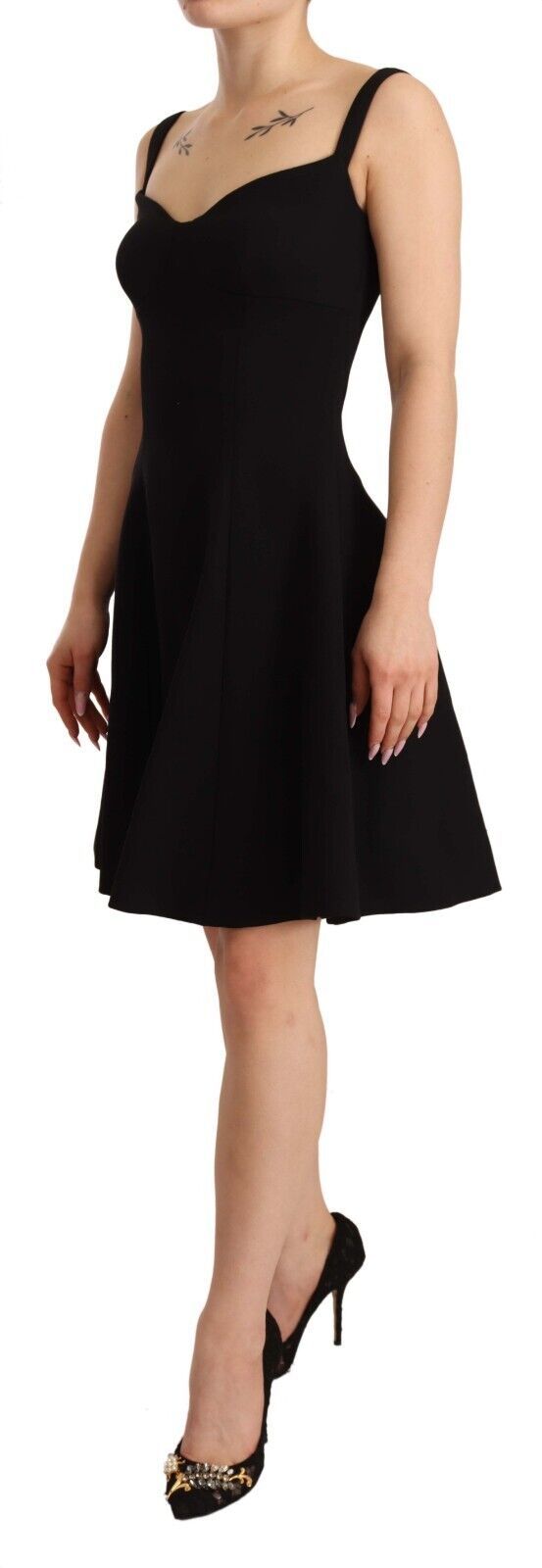 Dolce & Gabbana black fit flare wool stretch sheath dress displayed on a hanger with a sleek silhouette.