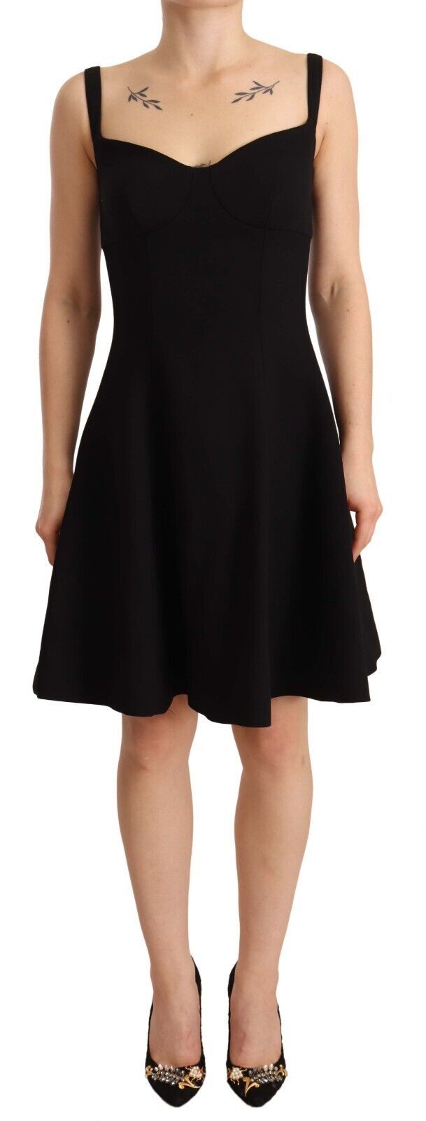 Black Dolce & Gabbana fit and flare wool stretch sheath dress displayed on a hanger with a smooth fabric texture.