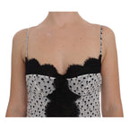 Black silk lace babydoll lingerie top by Dolce & Gabbana, featuring intricate lace details and a delicate, feminine design.