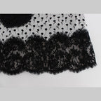 Black silk lace babydoll lingerie top by Dolce & Gabbana with intricate lace details and delicate satin ribbons.