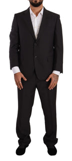 Dark gray Domenico Tagliente single-breasted formal suit with notch lapel and tailored fit, displayed on a hanger.