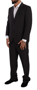 Dark gray Domenico Tagliente single-breasted formal suit jacket, tailored with lapel collar and sleek design.
