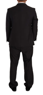 Dark gray Domenico Tagliente single-breasted formal suit, tailored with a classic fit and lapel details, displayed on a hanger.