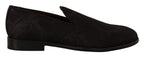 Dolce & Gabbana black floral brocade slippers loafers showing detailed floral pattern and luxurious fabric.