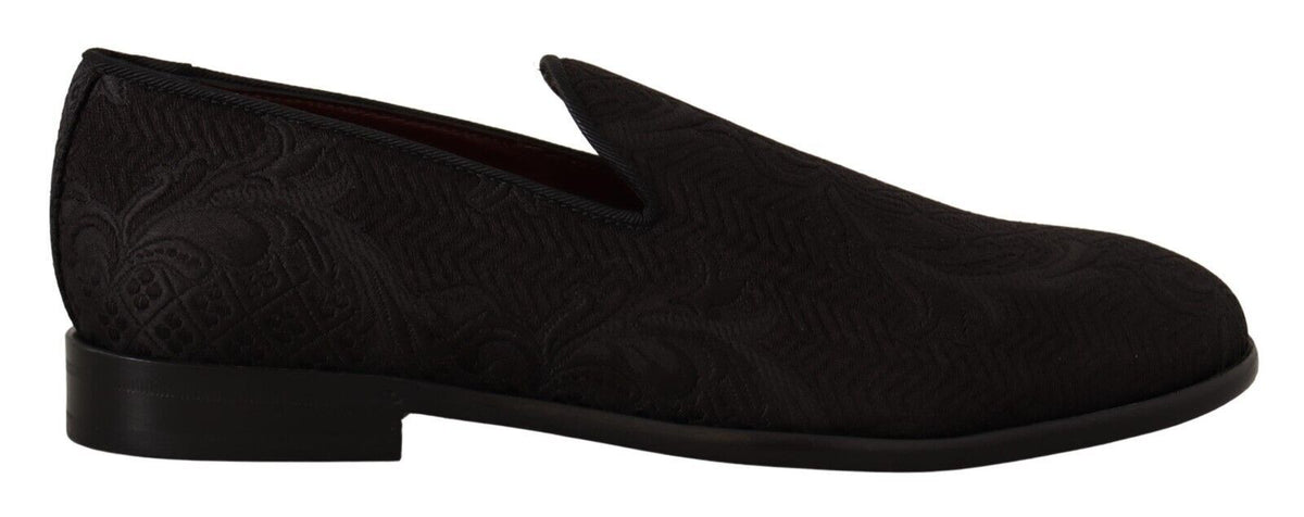 Dolce & Gabbana black floral brocade slippers loafers showing detailed floral pattern and luxurious fabric.