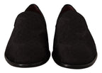 Dolce & Gabbana black floral brocade slippers with loafers design, detailed floral pattern, and luxurious fabric.