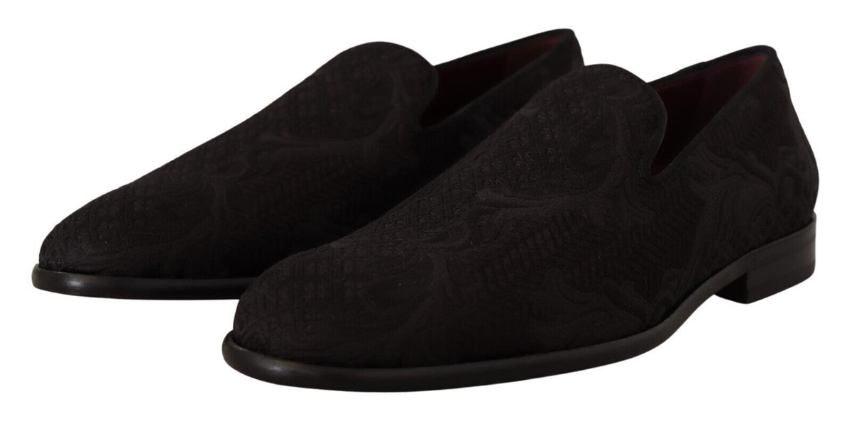 Dolce & Gabbana black floral brocade slippers with loafer style and elegant design, showcasing intricate floral patterns.