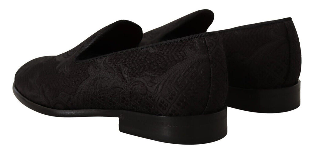 Dolce & Gabbana black floral brocade slippers with loafers design, featuring intricate floral pattern and luxurious fabric.
