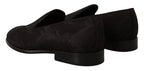 Dolce & Gabbana black floral brocade slippers with loafers design, featuring intricate floral pattern and luxurious fabric.