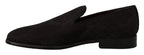 Dolce & Gabbana black floral brocade slippers with loafers style, featuring intricate floral pattern and luxurious fabric.