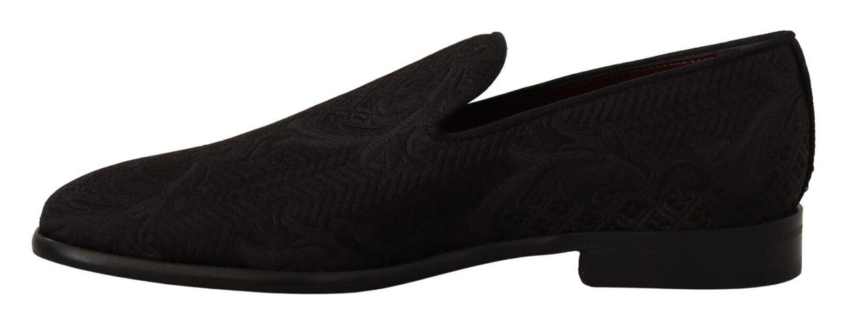 Dolce & Gabbana black floral brocade slippers with loafers style, featuring intricate floral pattern and luxurious fabric.