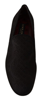 Dolce & Gabbana black floral brocade slippers with loafers style, featuring intricate floral pattern and elegant design.