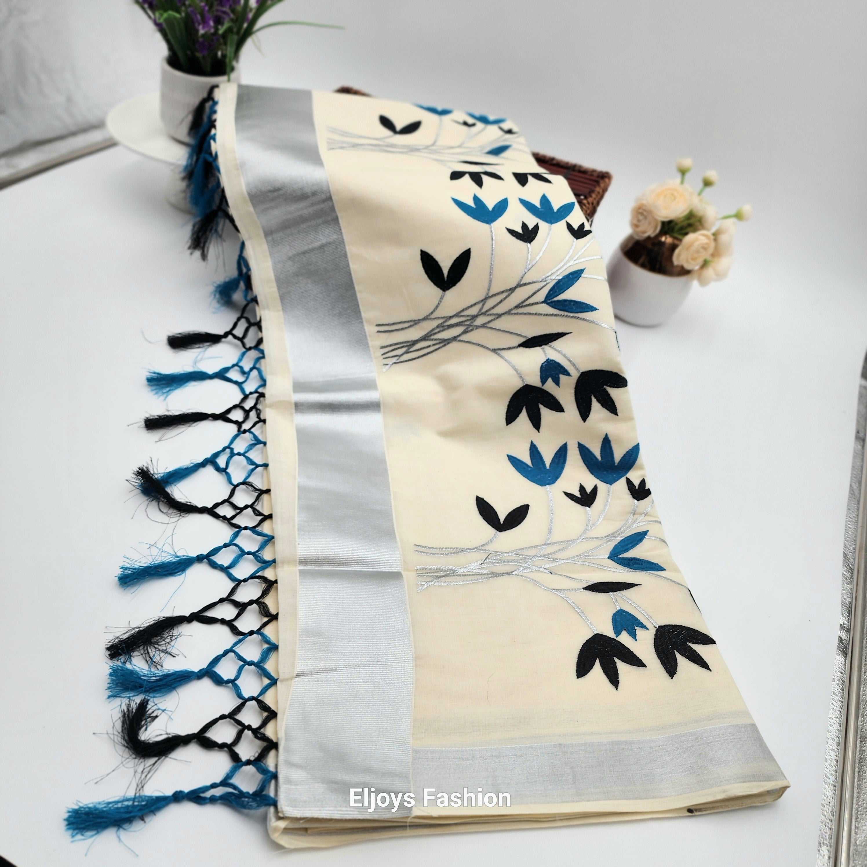 Tissue Silk Saree featuring Silver, Blue and Black floral design with Silver border. Eljoys Fashion