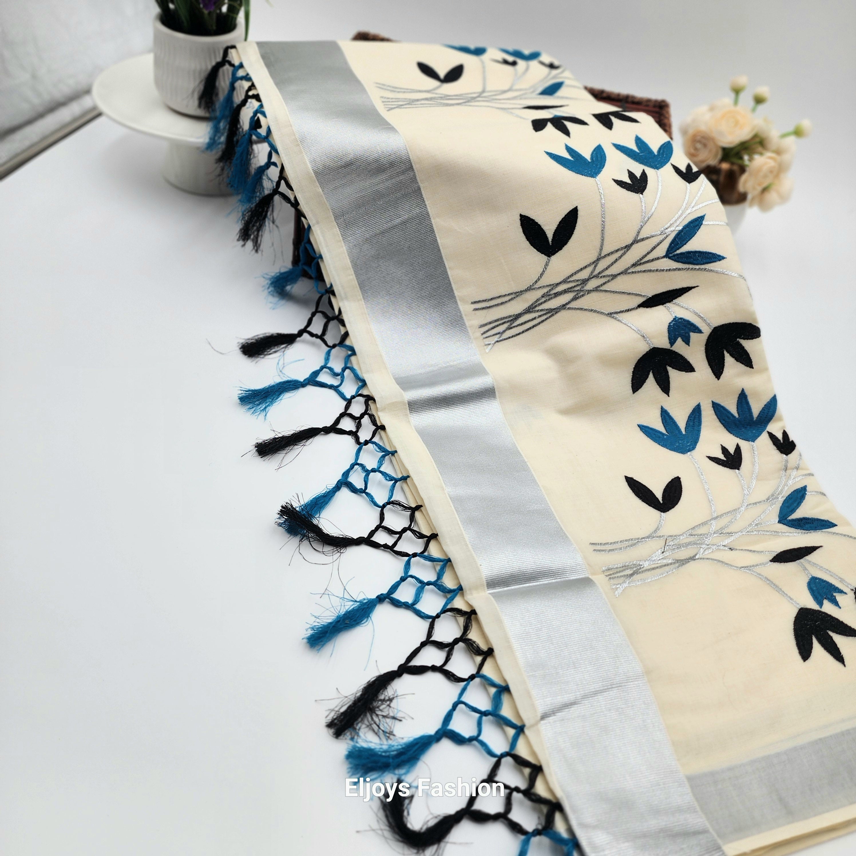 Tissue Silk Saree featuring Silver, Blue and Black floral design with Silver border. Eljoys Fashion
