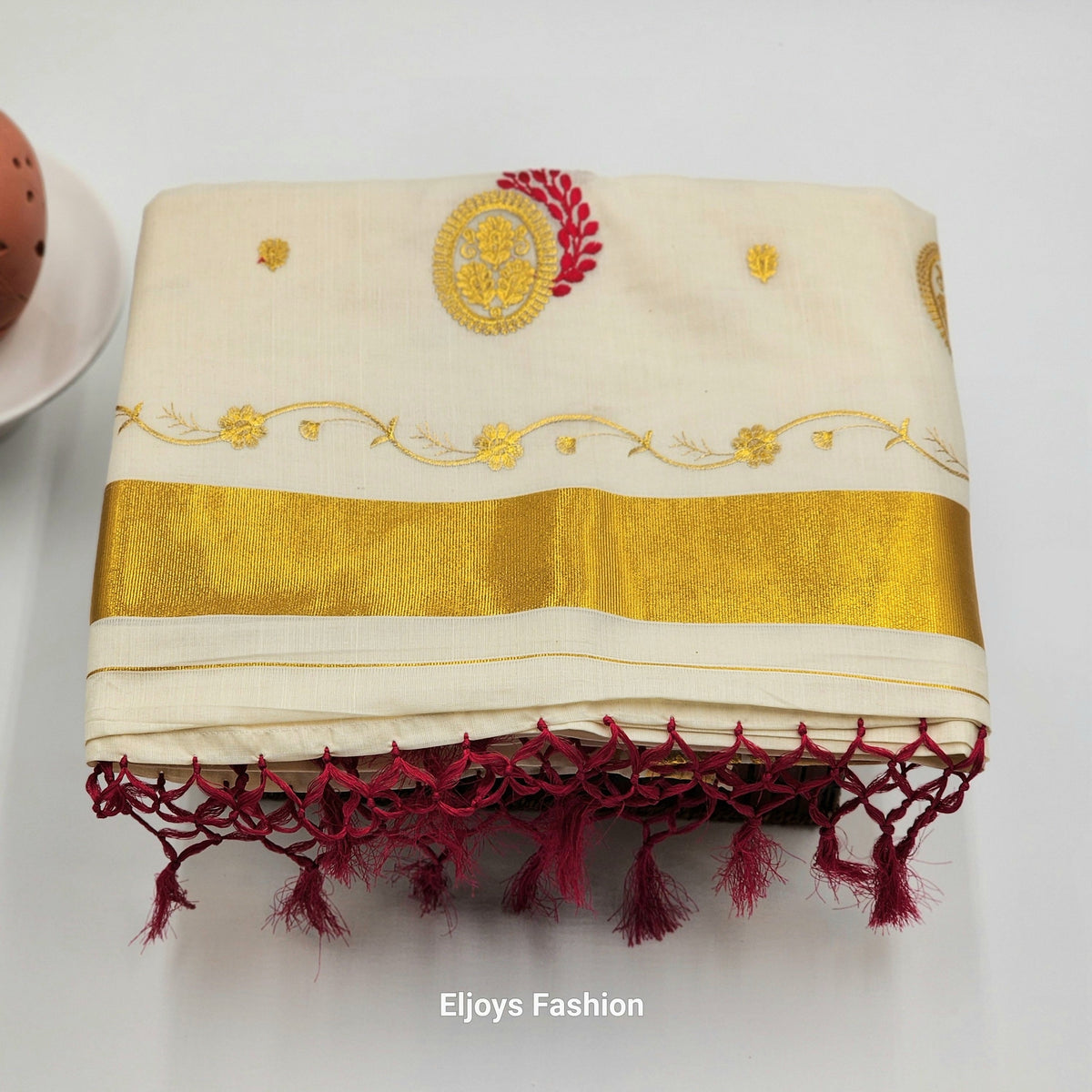 Tissue Silk Saree in Royal gold and red Floral design with Royal gold border Eljoys Fashion