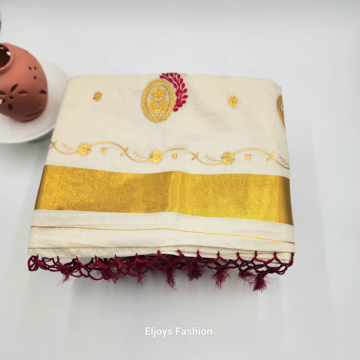 Tissue Silk Saree in Royal gold and red Floral design with Royal gold border Eljoys Fashion