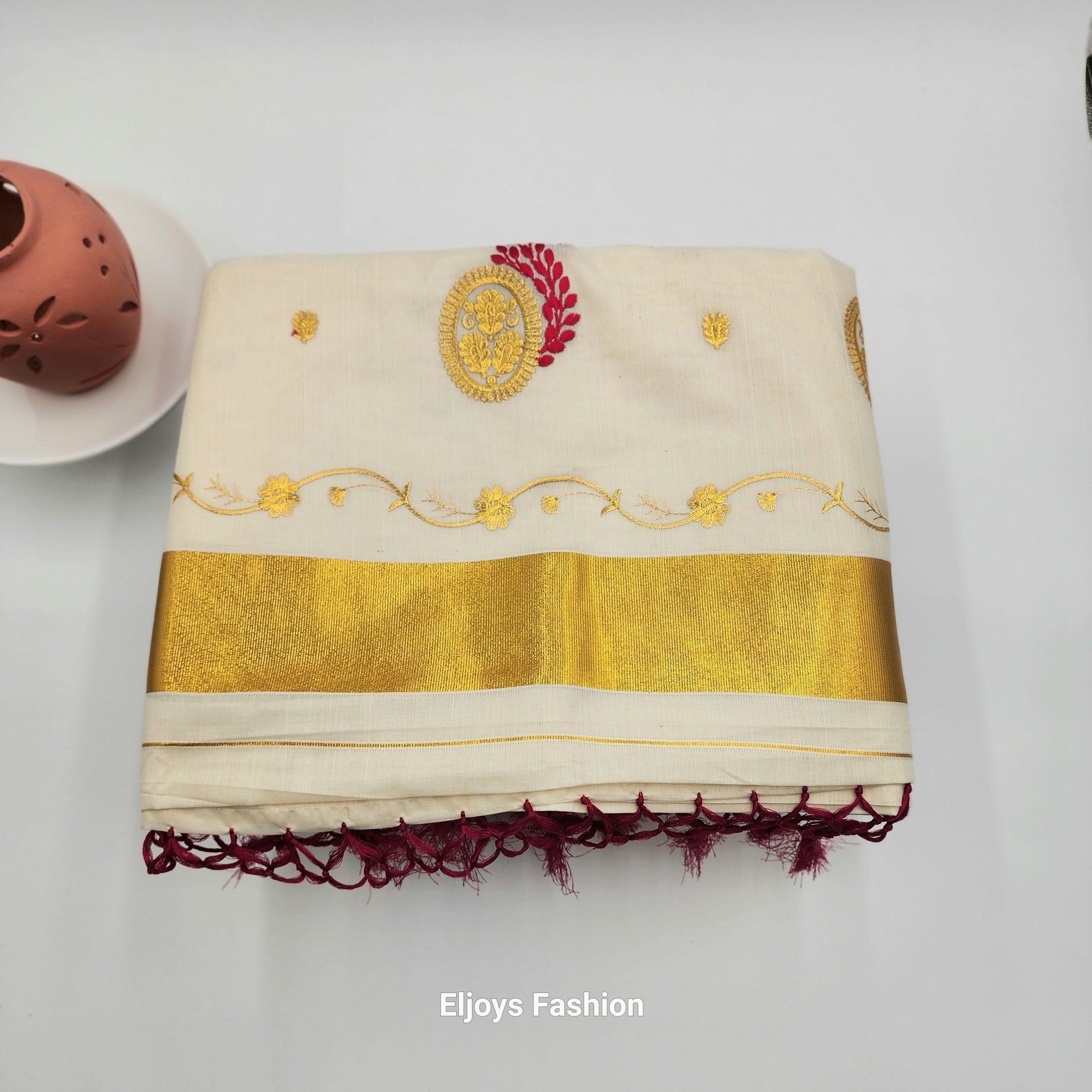 Tissue Silk Saree in Royal gold and red Floral design with Royal gold border Eljoys Fashion