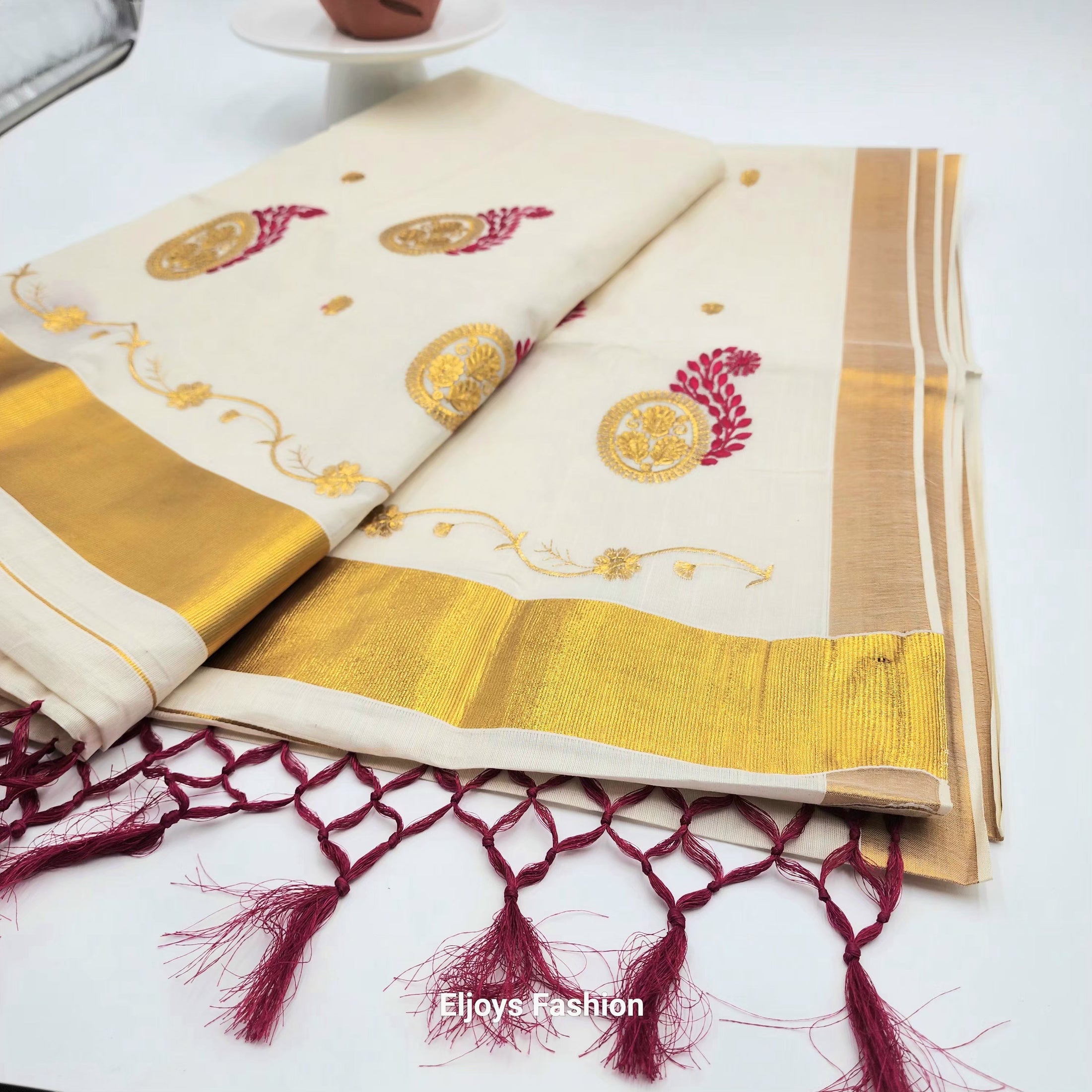 Tissue Silk Saree in Royal gold and red Floral design with Royal gold border Eljoys Fashion