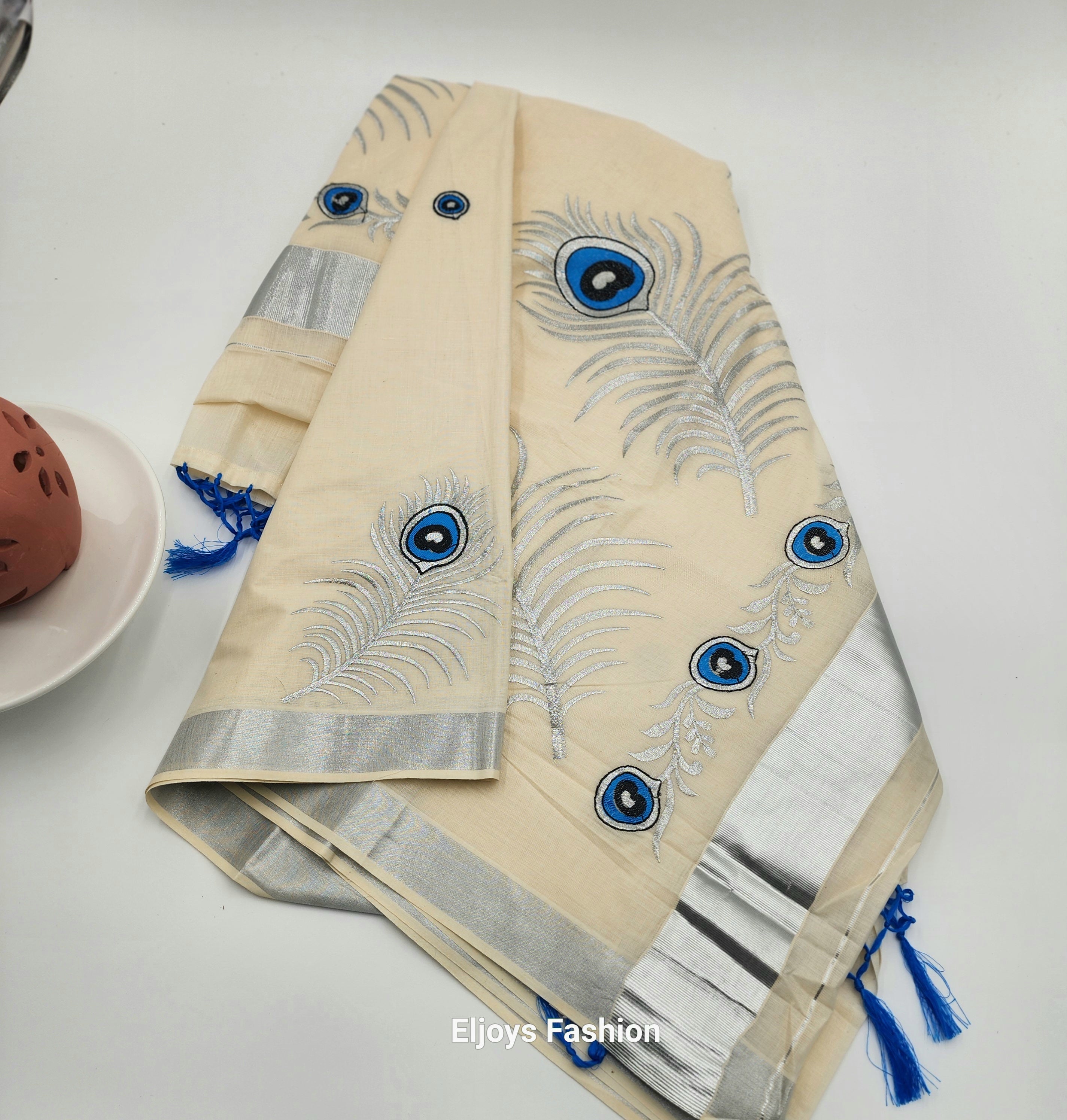 Tissue Silk saree with covert design and Silver borders in stunning silver ,Blue and black color combination Eljoys Fashion