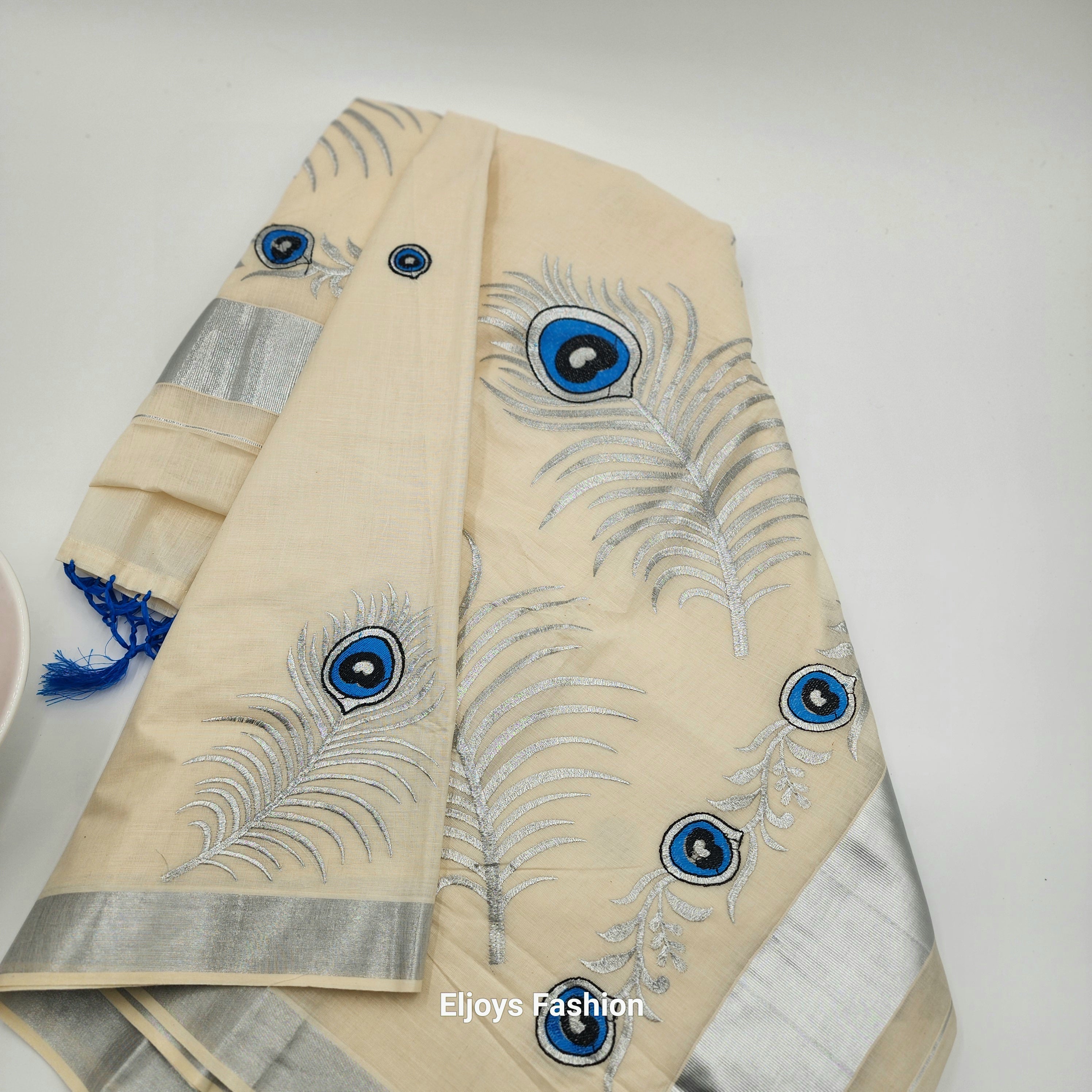 Tissue Silk saree with covert design and Silver borders in stunning silver ,Blue and black color combination Eljoys Fashion