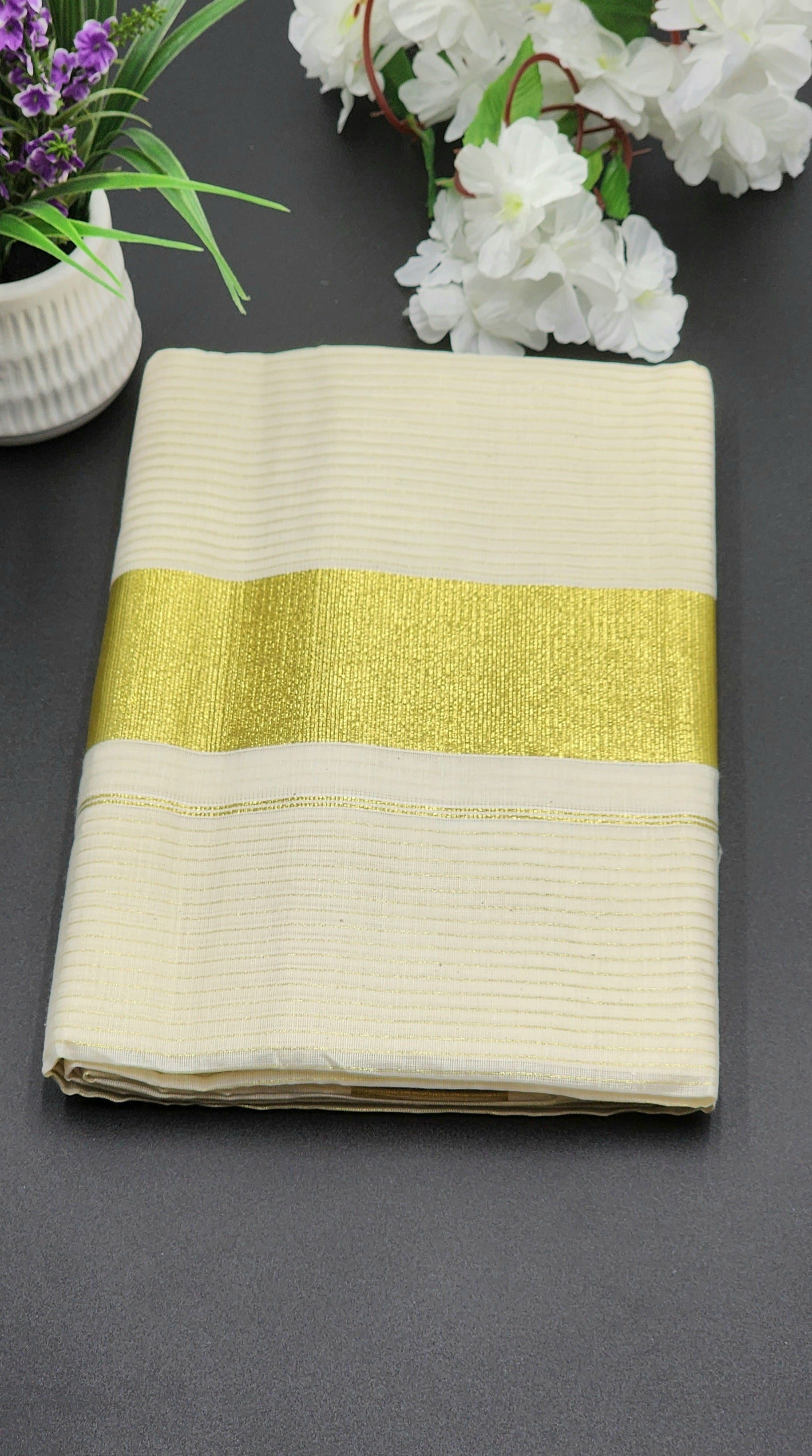 Tissue Silk Traditional Kerala saree with medium gold border and horizontal full body line