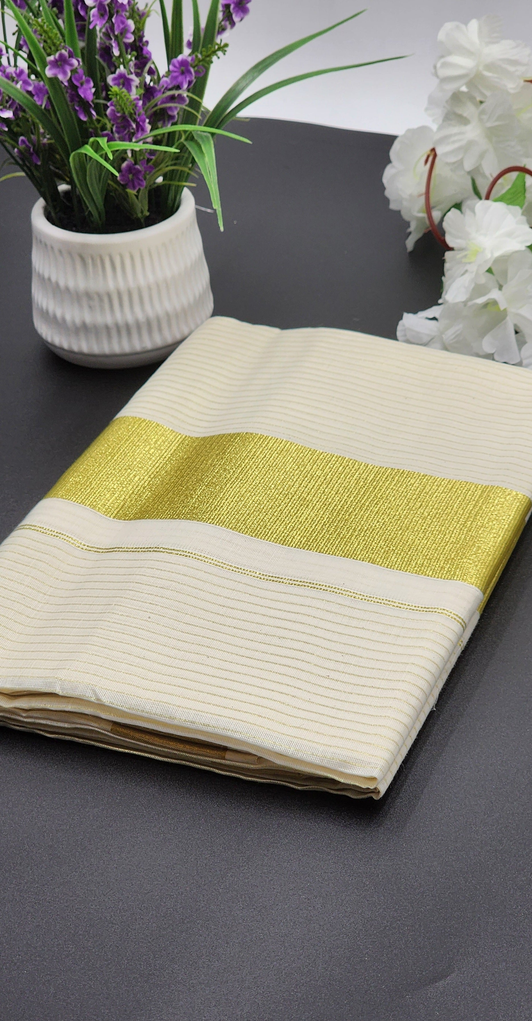 Tissue Silk Traditional Kerala saree with medium gold border and horizontal full body line